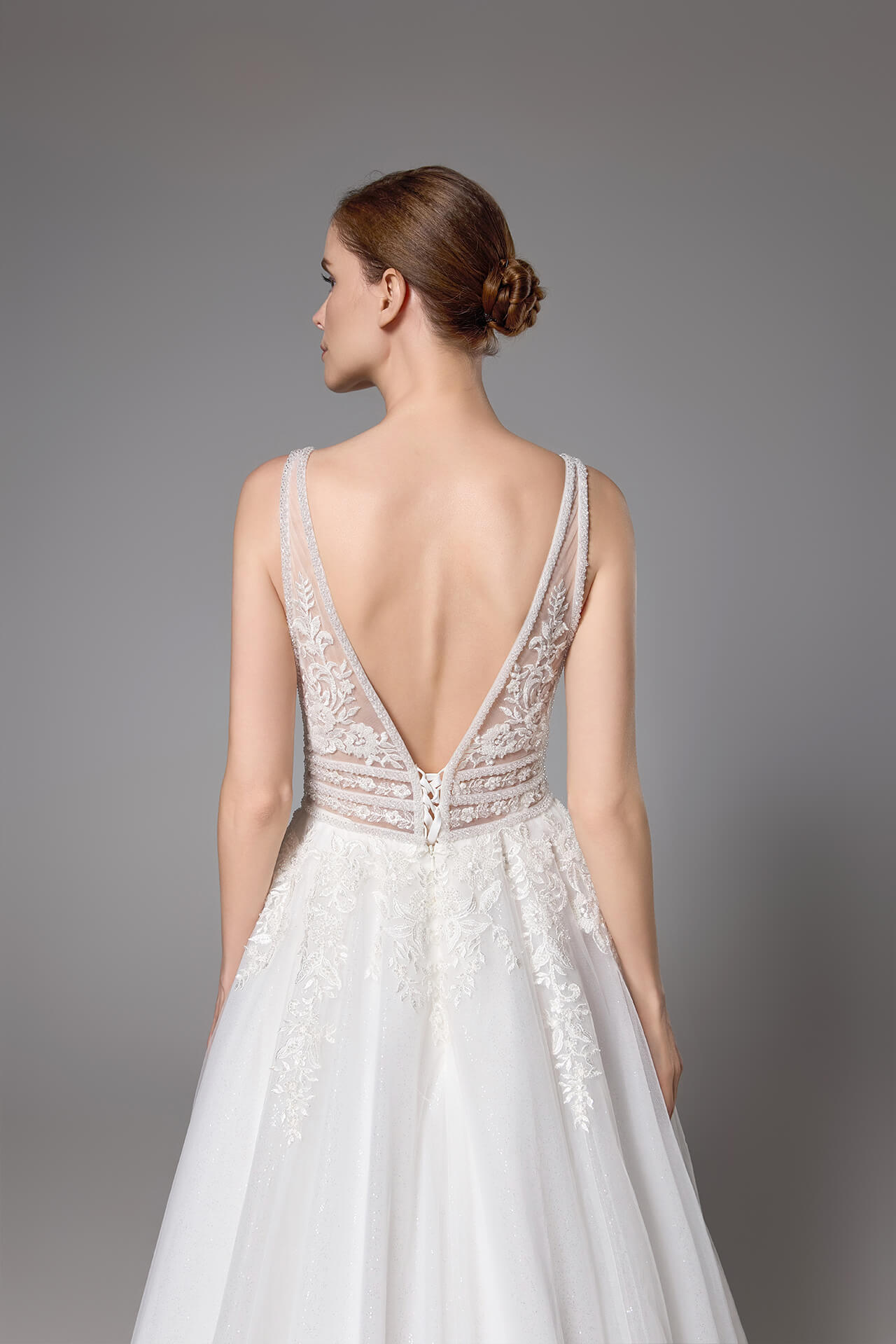 Sexy beaded wedding gown with a plunging V-neck and sexy V-back LVB2419