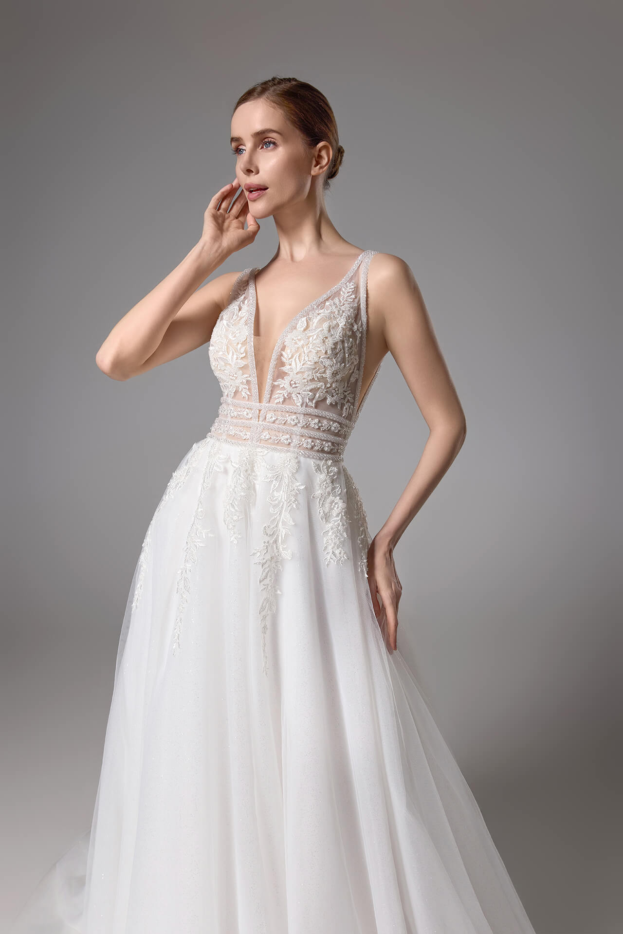 Sexy beaded wedding gown with a plunging V-neck and sexy V-back LVB2419