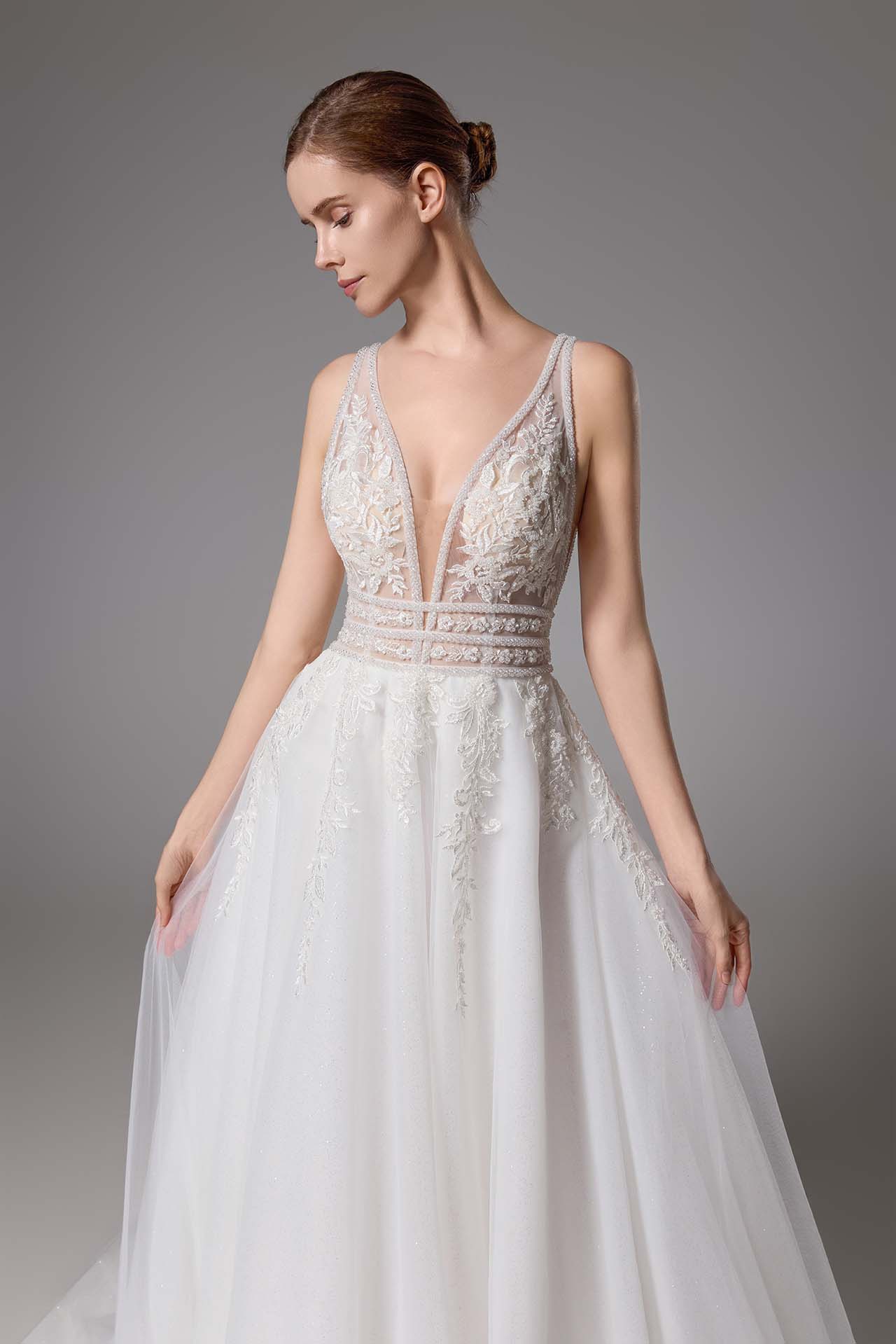 Sexy beaded wedding gown with a plunging V-neck and sexy V-back LVB2419