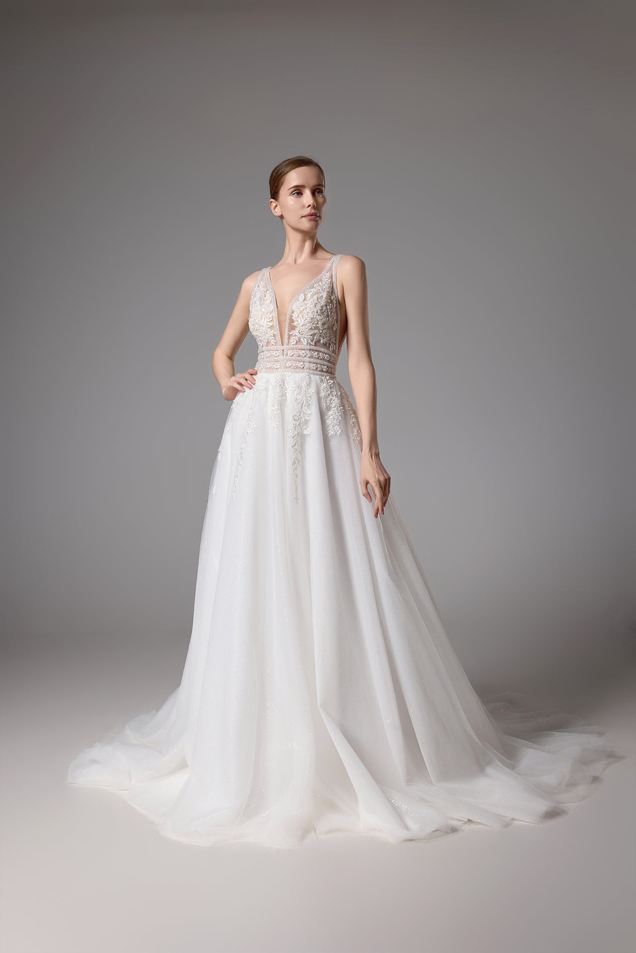 Sexy beaded wedding gown with a plunging V-neck and sexy V-back LVB2419