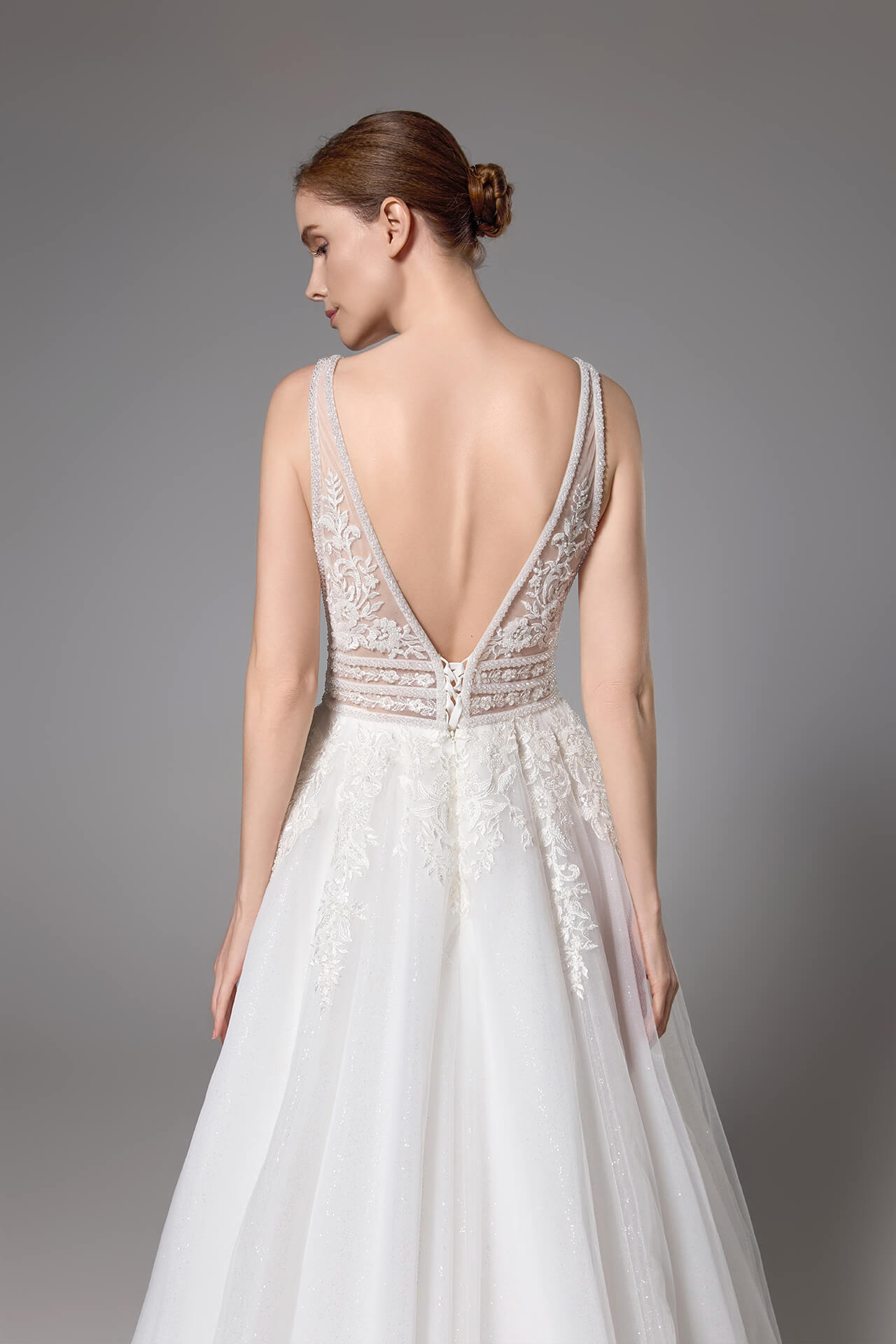 Sexy beaded wedding gown with a plunging V-neck and sexy V-back LVB2419