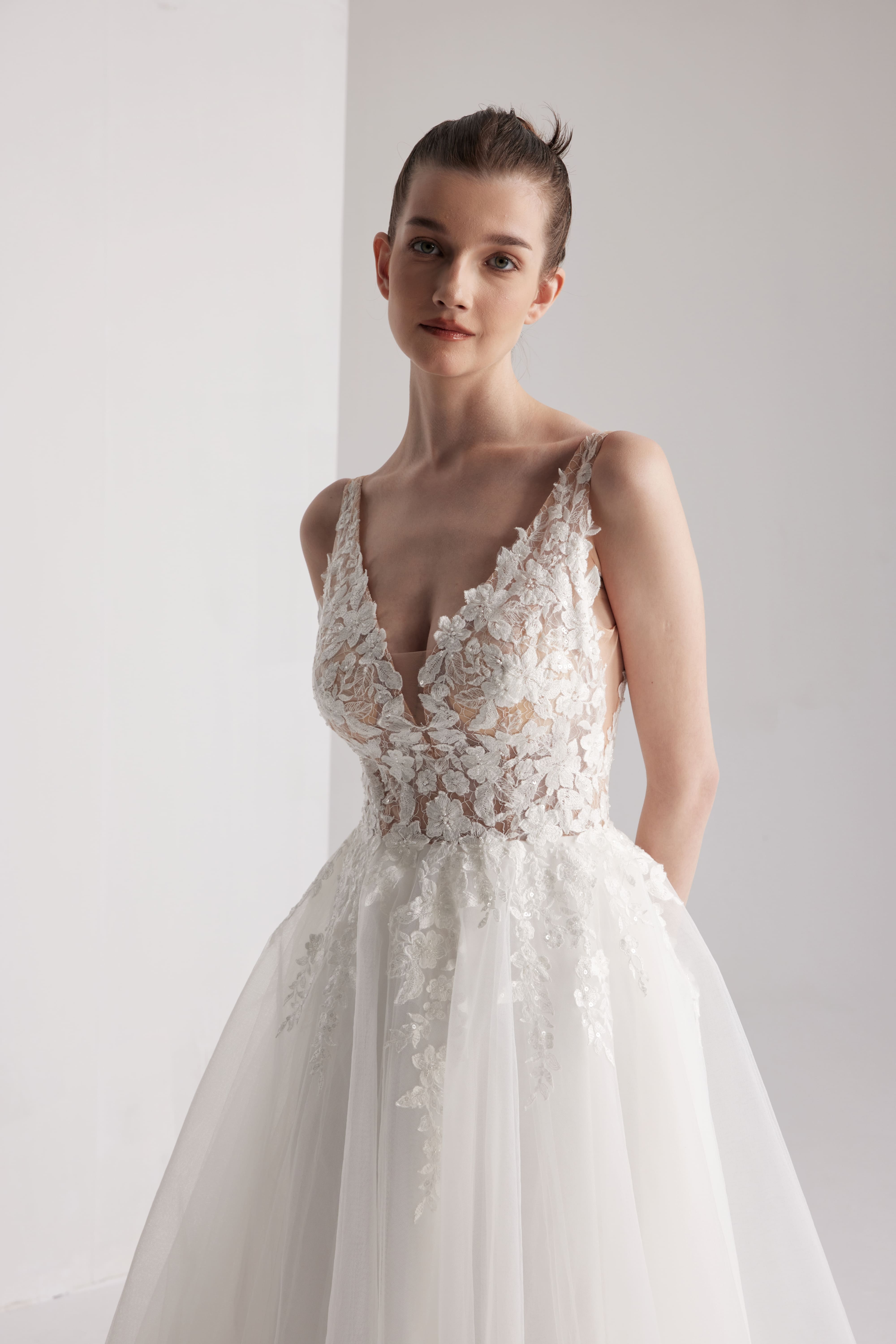 Romantic floral wedding dress with a deep V-neckline and sexy open back LVB2417