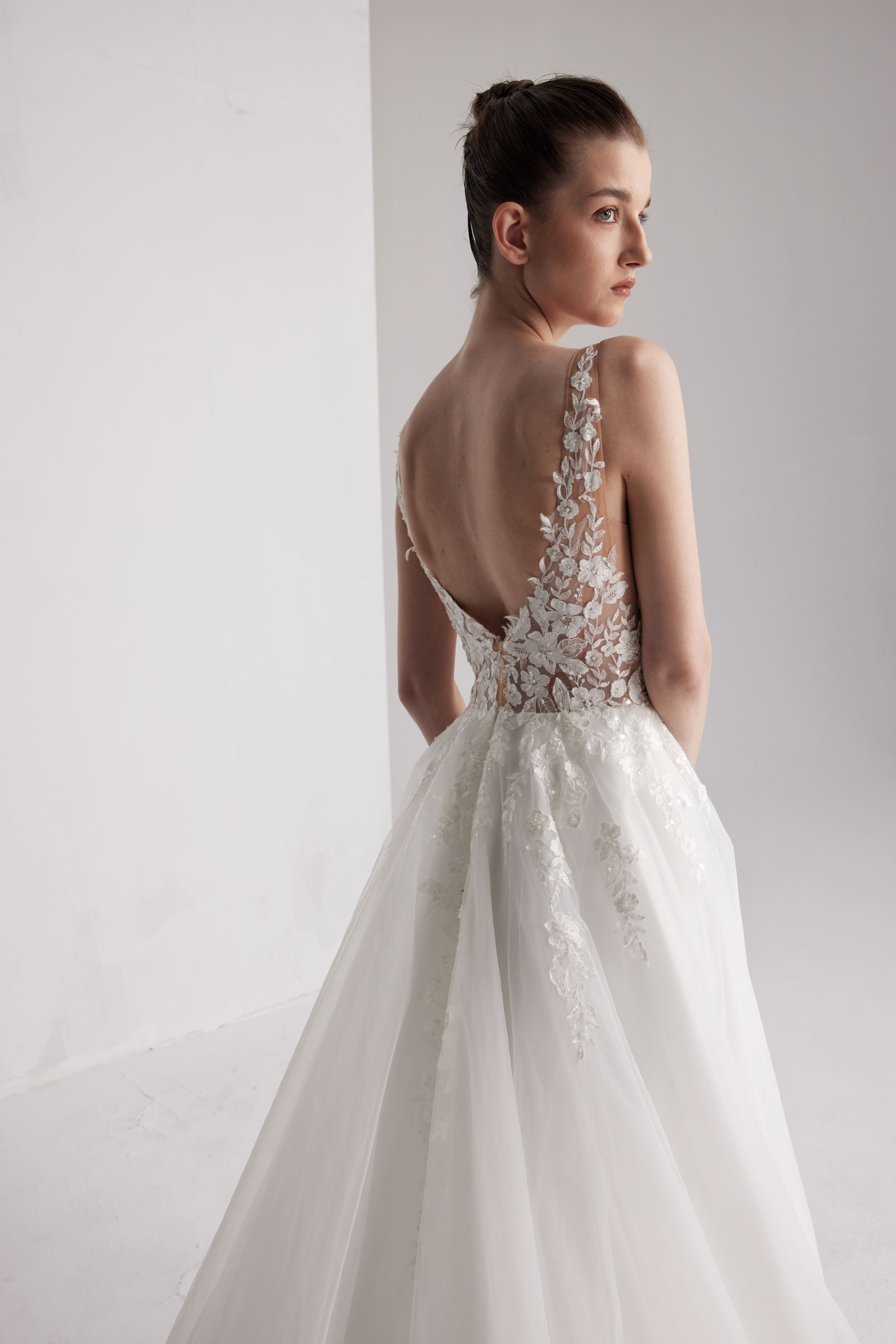 Romantic floral wedding dress with a deep V-neckline and sexy open back LVB2417