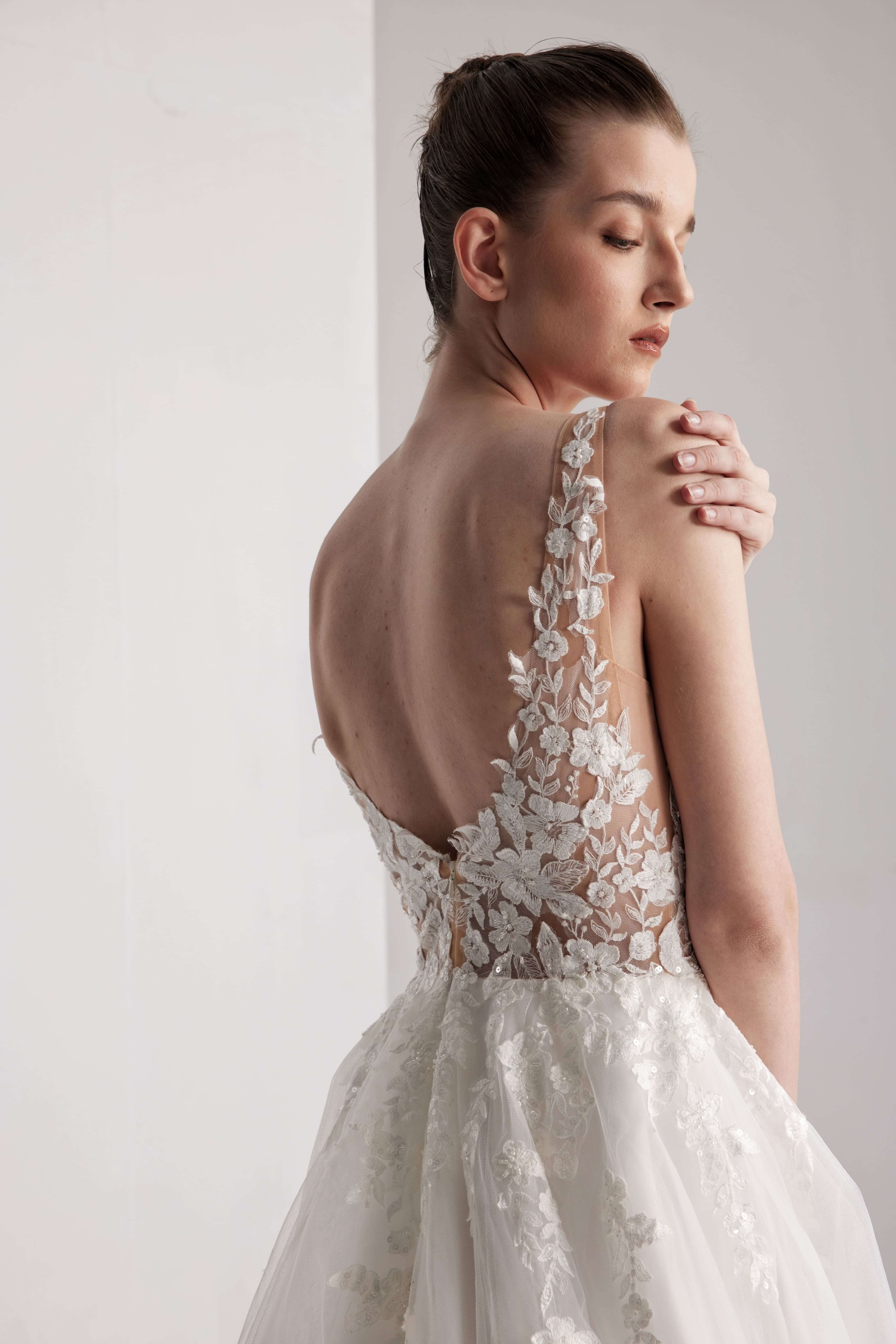 Romantic floral wedding dress with a deep V-neckline and sexy open back LVB2417