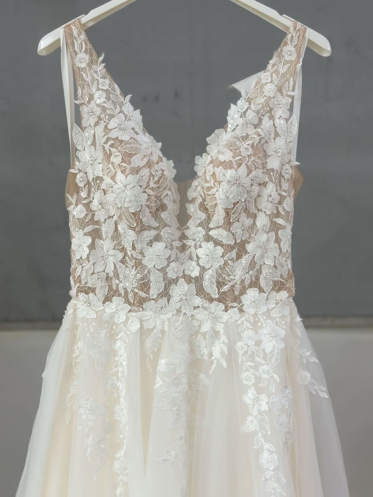 Romantic floral wedding dress with a deep V-neckline and sexy open back LVB2417