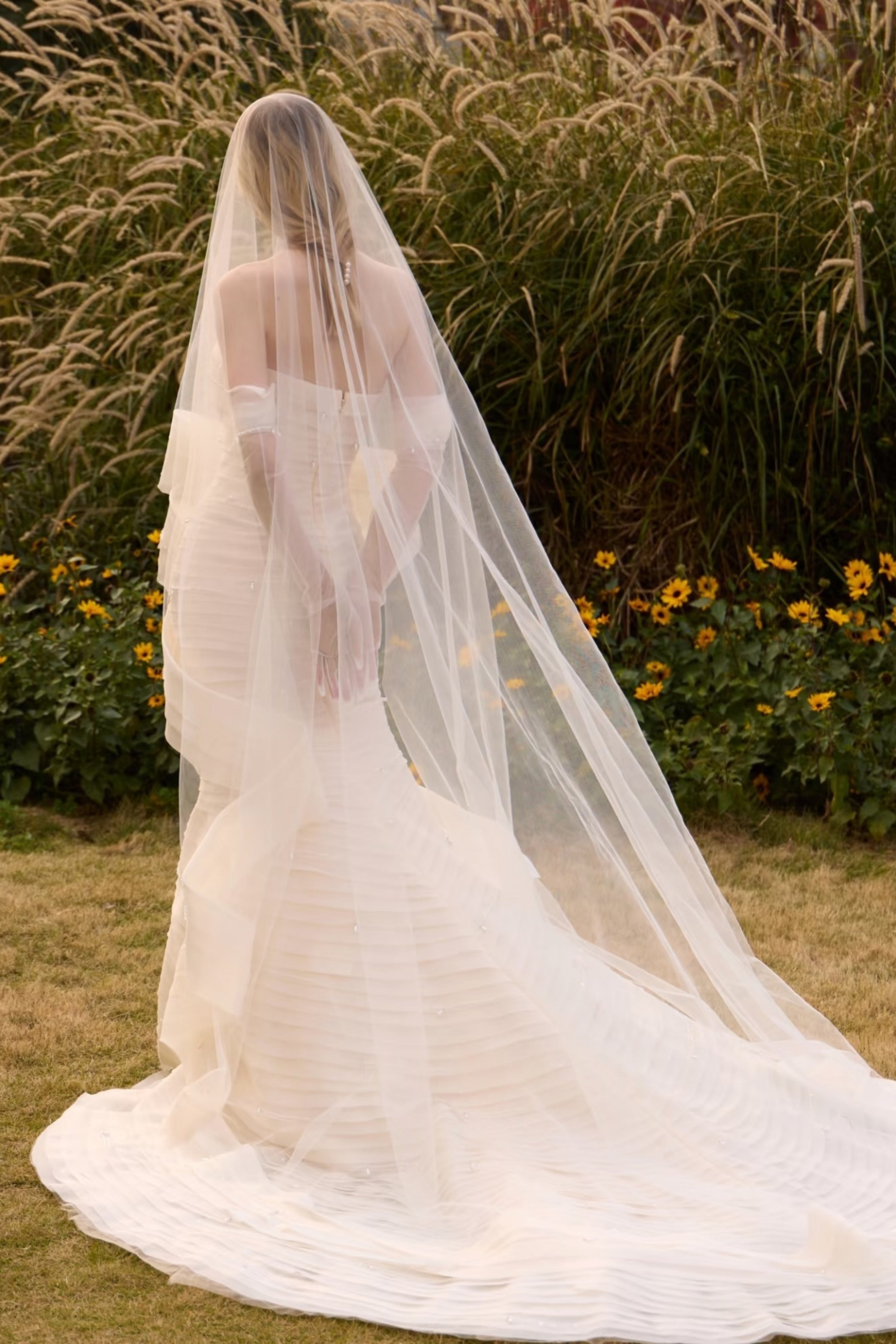 Elegant strapless tiered mermaid wedding gown with veil and gloves LVB2747